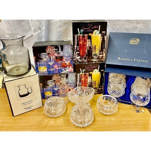 71 - Assortment of boxed crystal glassware and other glass pieces to include Wedgwood and bohemian