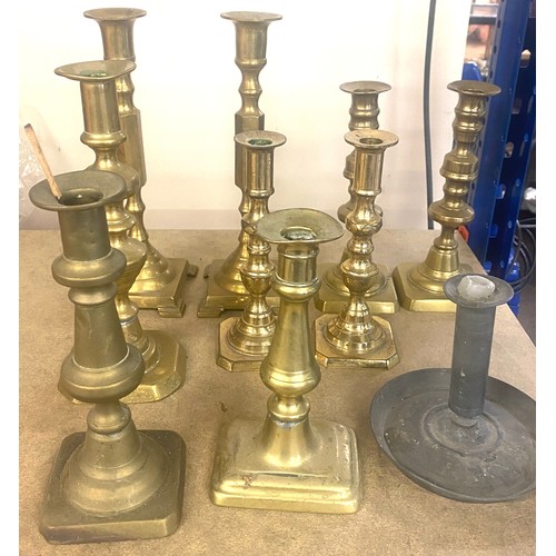 65 - Selection of brass candle sticks