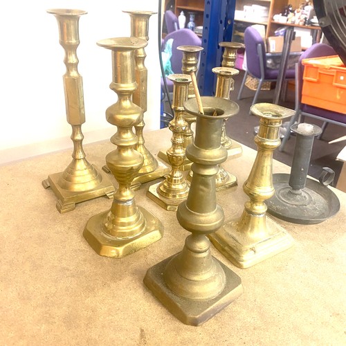 65 - Selection of brass candle sticks