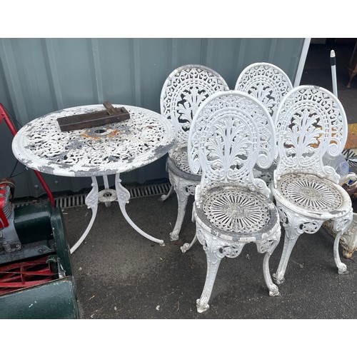 100j - Cast aluminium table and 4 chairs