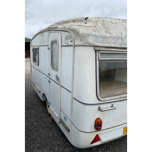 99A - 2 Berth viking fibreline caravan, please see images for condition