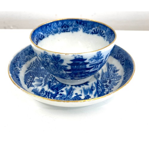 40 - Early 19th century tea bowl and saucer blue and white, over all good condition