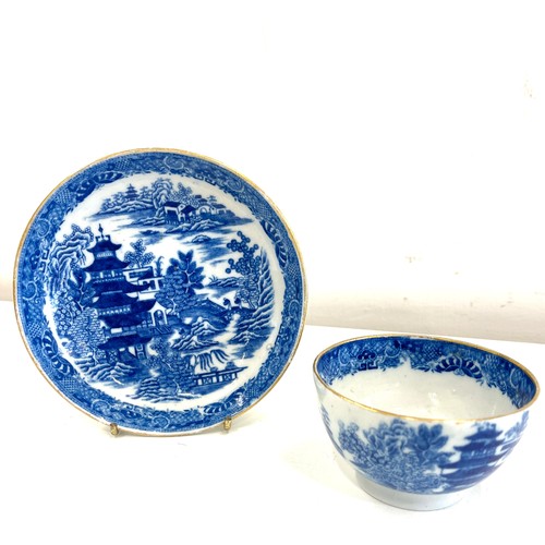 40 - Early 19th century tea bowl and saucer blue and white, over all good condition