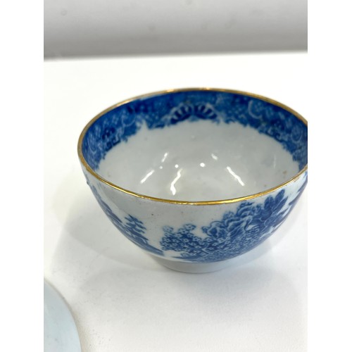 40 - Early 19th century tea bowl and saucer blue and white, over all good condition