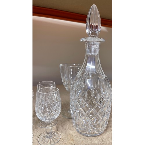 48 - Cut glass decanter and a selection of cut glass glasses