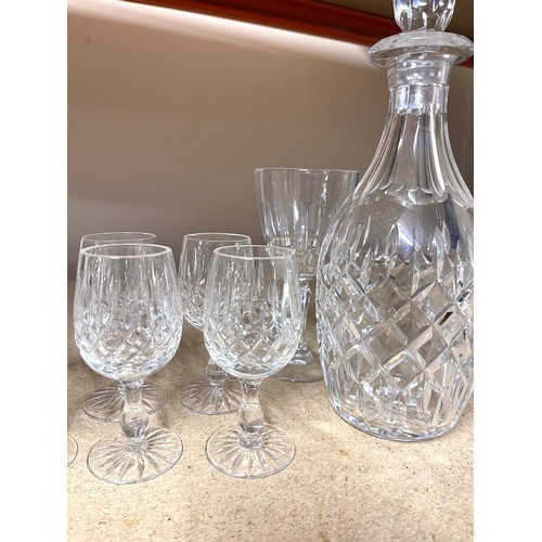 48 - Cut glass decanter and a selection of cut glass glasses