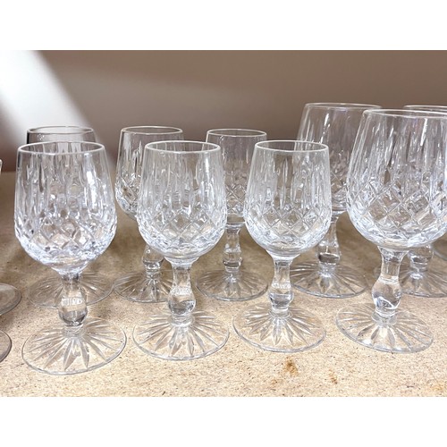 48 - Cut glass decanter and a selection of cut glass glasses