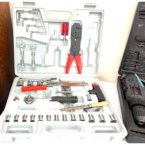 21 - Selection of cased tools to include a socket set and 2 drills, all untested