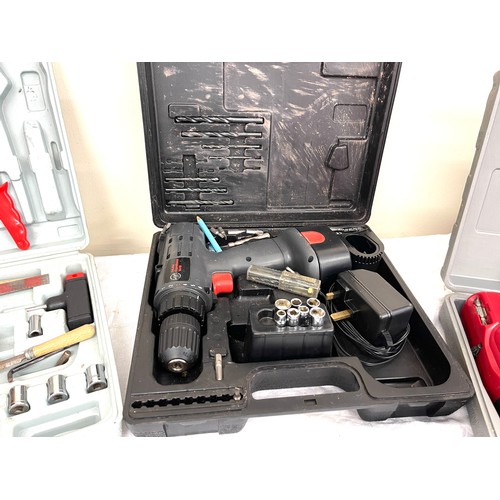 21 - Selection of cased tools to include a socket set and 2 drills, all untested