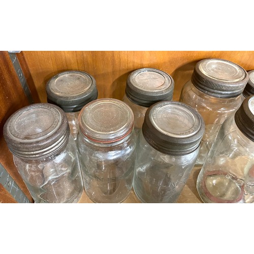 106 - Large selection of vintage glass Forsters and Kilner lidded jars