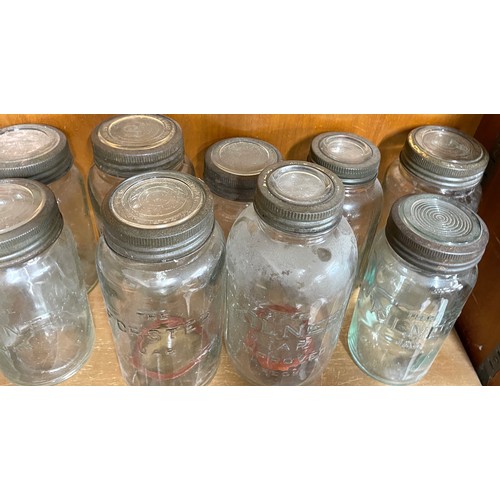 106 - Large selection of vintage glass Forsters and Kilner lidded jars