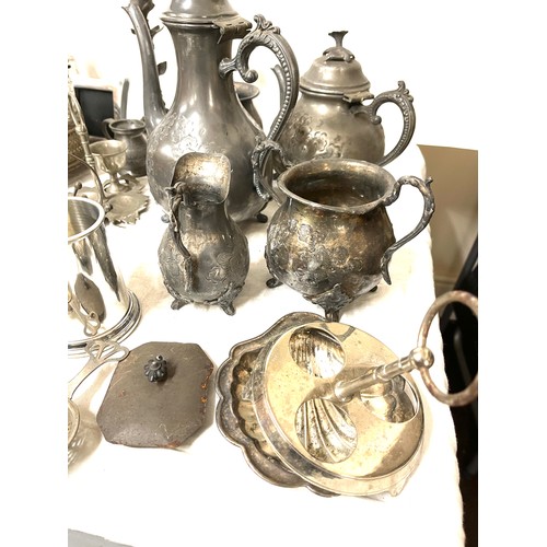 150 - Selection silver plated ware to include condiment glass bottles, tea pot etc,