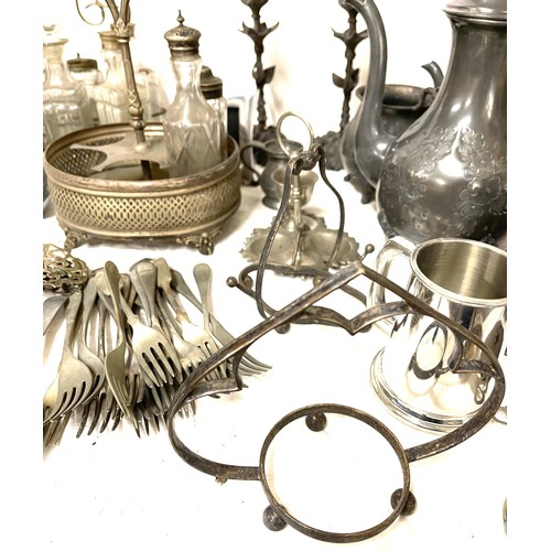 150 - Selection silver plated ware to include condiment glass bottles, tea pot etc,