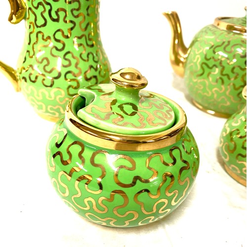 136 - Sudlow Burslem teapot, milk jug, sugar, water jug green and gold puzzle pattern, overall good condit... 