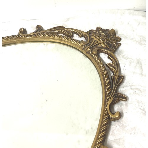 76 - Vintage metal framed ornate mirror, Height 26 inches, Width 16 inches