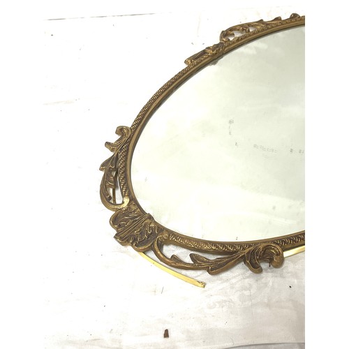 76 - Vintage metal framed ornate mirror, Height 26 inches, Width 16 inches