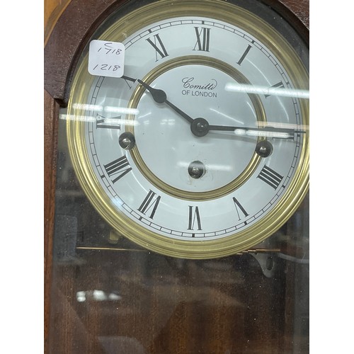 22 - Small inlaid wall clock, with pendulum and key