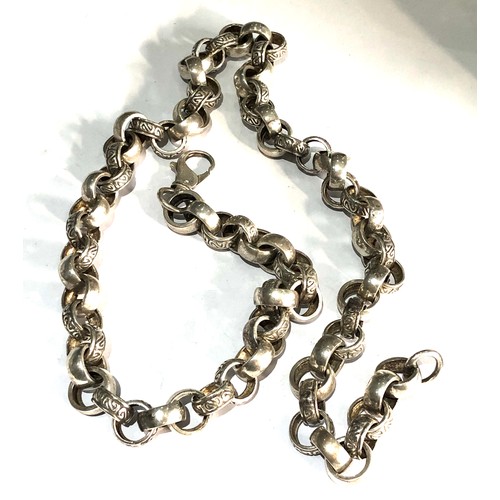 403 - Heavy  silver chain carved link chain measures approx 25ins long weight 115g