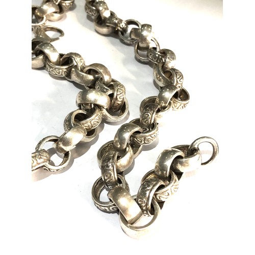 403 - Heavy  silver chain carved link chain measures approx 25ins long weight 115g