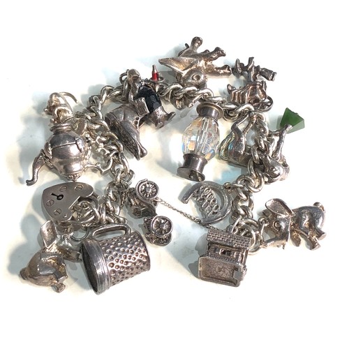 404 - Vintage silver charm bracelet weight 96g