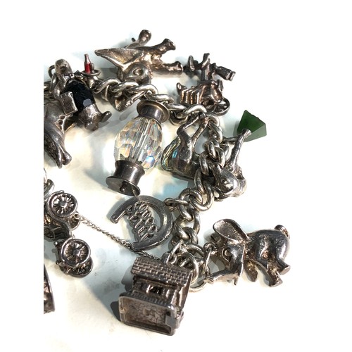 404 - Vintage silver charm bracelet weight 96g