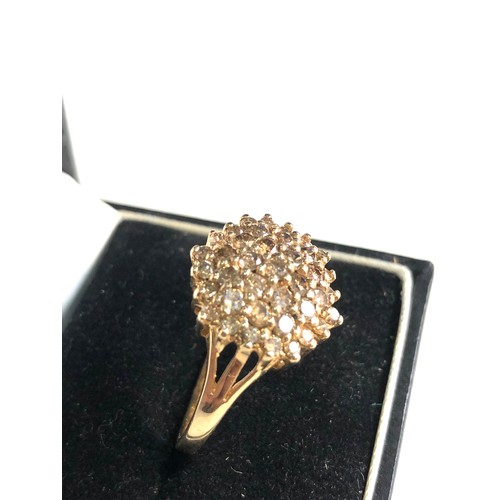 79 - 9ct gold Diamond cluster ring weight 5g 36 diamonds est 0.70ct