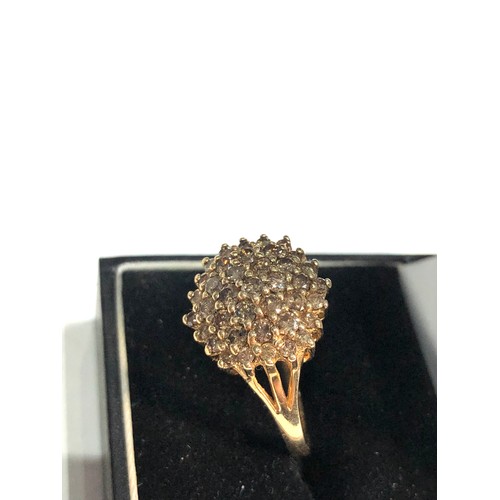 79 - 9ct gold Diamond cluster ring weight 5g 36 diamonds est 0.70ct