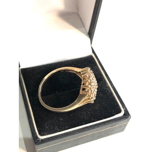 79 - 9ct gold Diamond cluster ring weight 5g 36 diamonds est 0.70ct