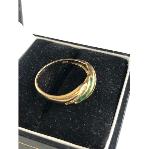 80 - 14ct gold diamond & emerald ring weight 2.2g