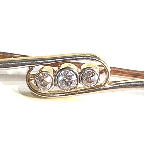 82 - Antique 18ct gold 3 stone diamond brooch measures approx 4.8cm long weight 4.1g