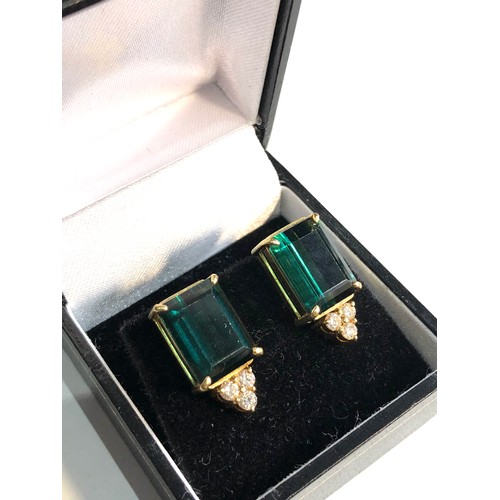 87 - Fine 18ct gold diamond tourmaline earrings measure approx 1.9cm drop by 1cm wide weight 8.4g