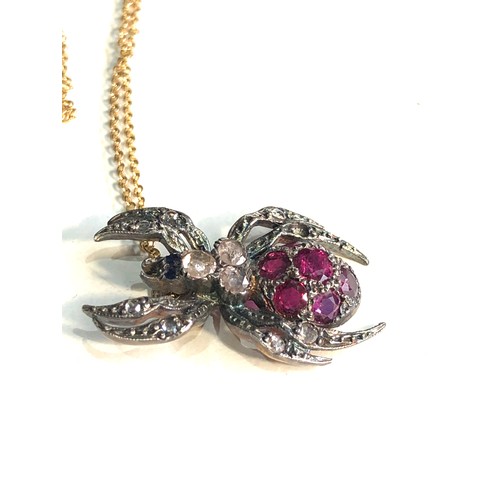 88 - Fine rose diamond & ruby spider pendant on 18ct gold chain pendant gold back silver front measures a... 