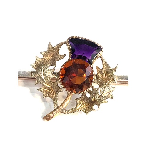 103 - Fine 18ct gold scottish thistle brooch set with amethyst and citrine stones measures approx 7cm by 2... 