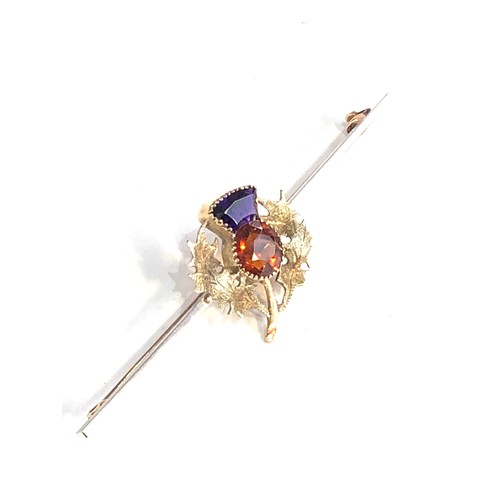 103 - Fine 18ct gold scottish thistle brooch set with amethyst and citrine stones measures approx 7cm by 2... 