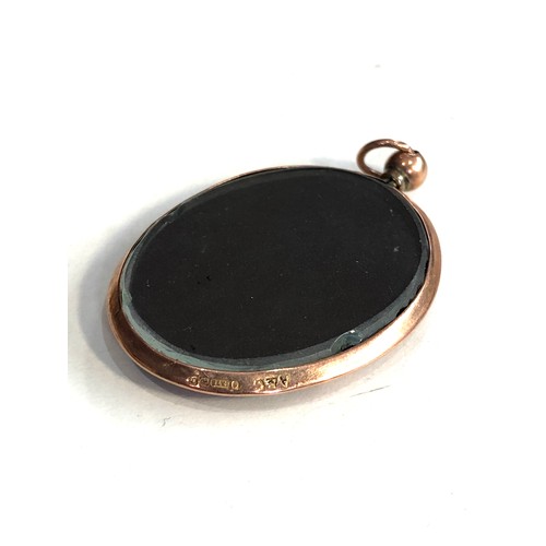 107 - Antique 9ct gold framed picture locket measures approx 4.2cm drop by 2.9cm wide weight 6.5g