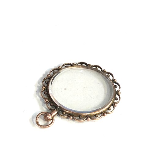 109 - Antique 9ct gold framed picture locket measures approx 4cm drop by 3.1cm wide weight 5g