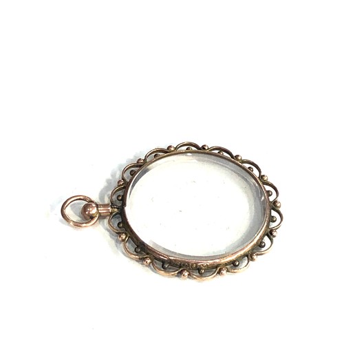 109 - Antique 9ct gold framed picture locket measures approx 4cm drop by 3.1cm wide weight 5g