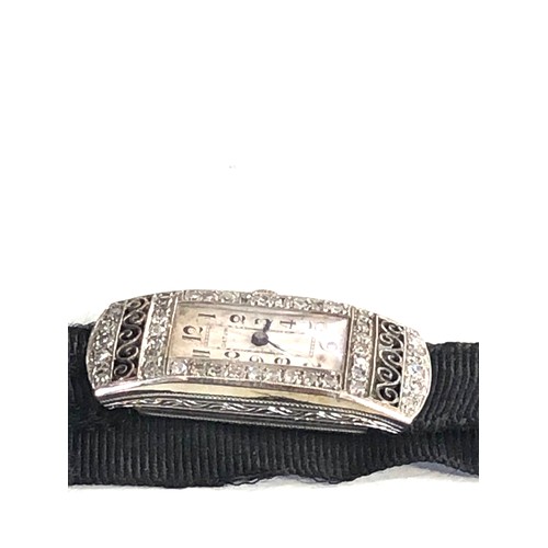 111 - 18ct white gold art deco diamond cocktail watch case measures approx 3.3cm by 1.4cm the watch is tic... 