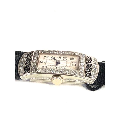 111 - 18ct white gold art deco diamond cocktail watch case measures approx 3.3cm by 1.4cm the watch is tic... 