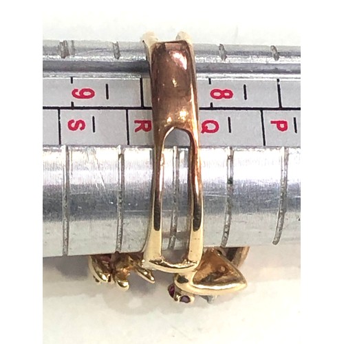 112 - 14ct gold diamond and ruby dress ring weight 6.3g