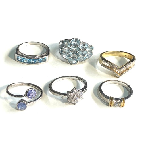 389 - Selection of 6 silver stone set dress rings