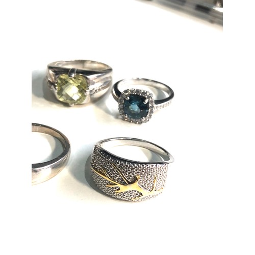 390 - Selection of 6 silver stone set dress rings