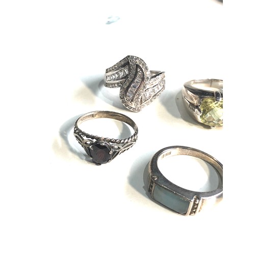 390 - Selection of 6 silver stone set dress rings