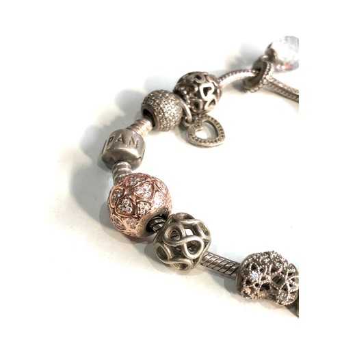 397 - Pandora silver charm bracelet and charms weight 60g