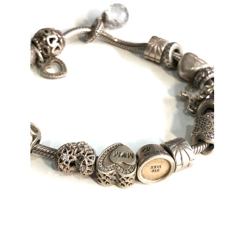 397 - Pandora silver charm bracelet and charms weight 60g