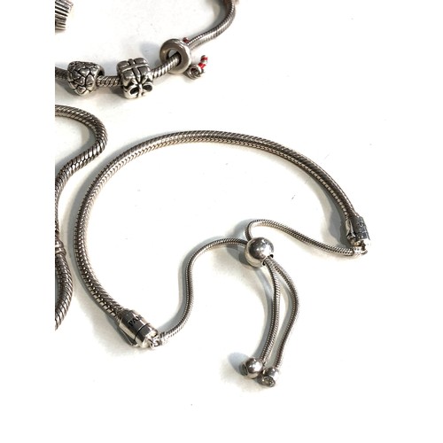 400 - 3 silver Pandora charm bracelets weight 57g