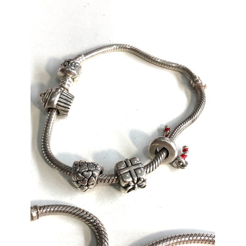 400 - 3 silver Pandora charm bracelets weight 57g