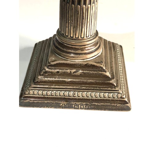 75 - Antique silver candle stick measures approx 15cm tall London silver hallmarks filled base