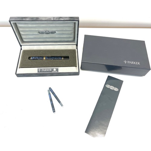 546 - Boxed Parker Duofold fountain pen, 18ct nib, never been used, blue marble effect.