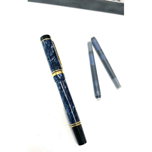 546 - Boxed Parker Duofold fountain pen, 18ct nib, never been used, blue marble effect.